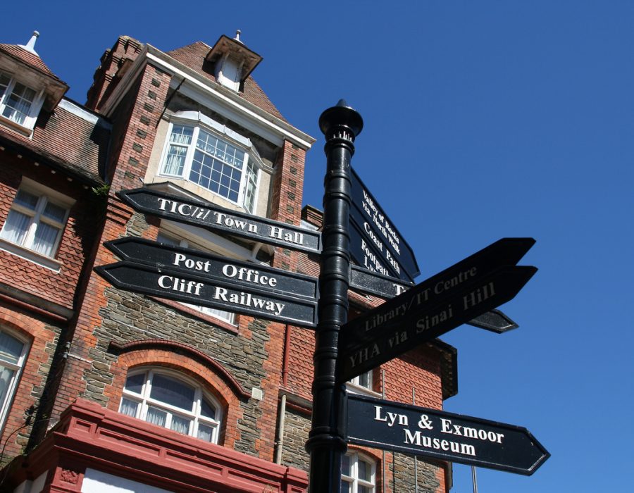 "Signpost in the village of Lynton, England."